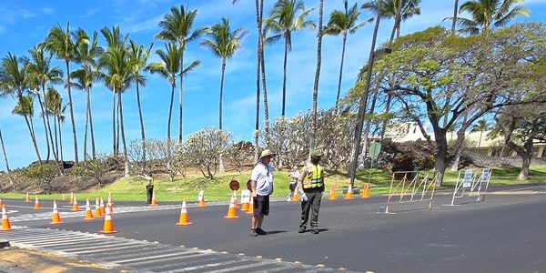 Kia'i International LLC officer managing traffic control on the Big Island